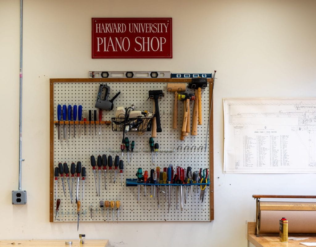 Harvard University Piano Shop signage with tools